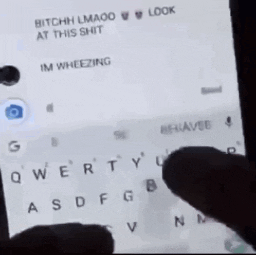 a person is typing on a cell phone with the words bitch lmaoo at this shit on the screen