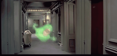 a ghost is flying through a hallway with a red door