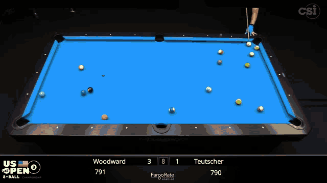 a pool table with a blue cloth that says us open on the top