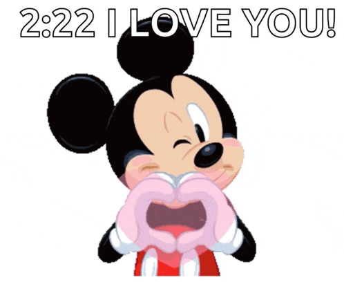 mickey mouse is making a heart shape with his hands and says 2:22 i love you