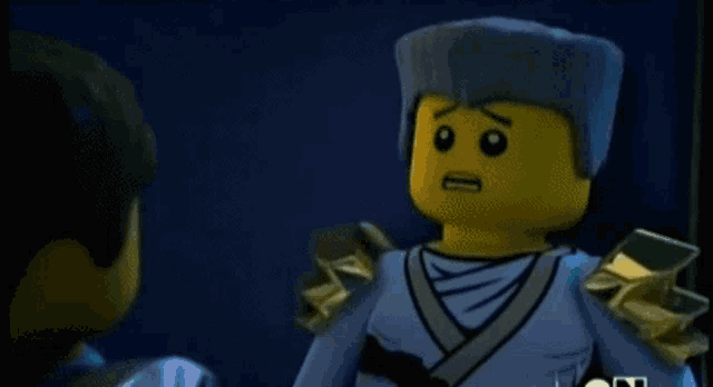 a close up of a lego ninjago character talking to another person .