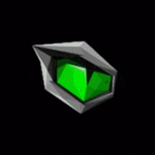 a green shield with a black background and a green cube inside of it .