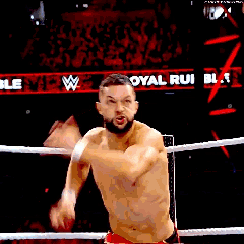 a shirtless wrestler in a ring with the words royal rui bl on the bottom