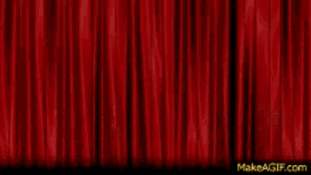 three spotlights are shining on a stage and the website makeagif.com is visible
