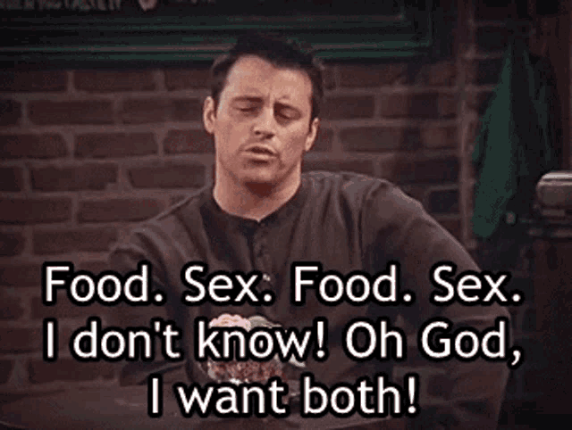a man sitting at a table with a brick wall behind him talking about food sex and sex