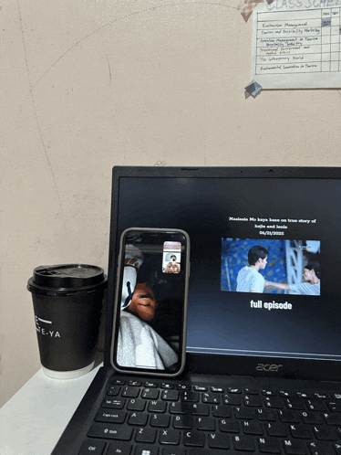an acer laptop is open to a full episode of a show