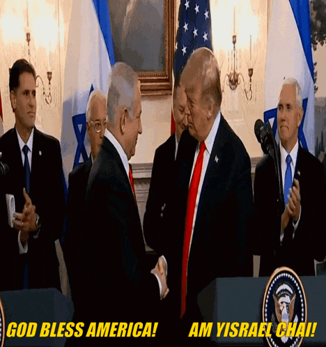 two men shake hands in front of a sign that says god bless america am yisrael chai
