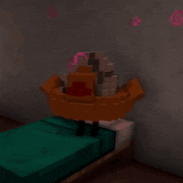a bed with a green blanket is in a dark room with pink swirls on the wall above it
