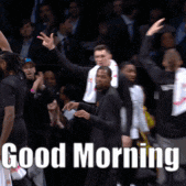 a group of people standing in front of a crowd with the words good morning on the bottom