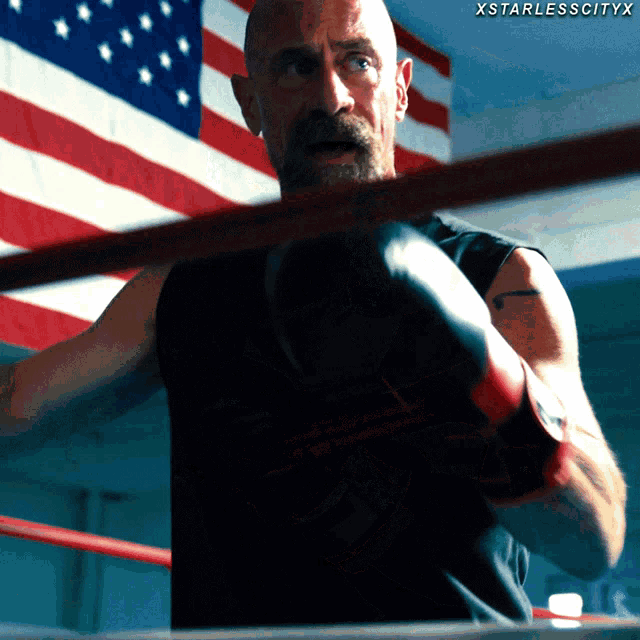 a man wearing boxing gloves in a boxing ring with xstarlesscityx written on the bottom