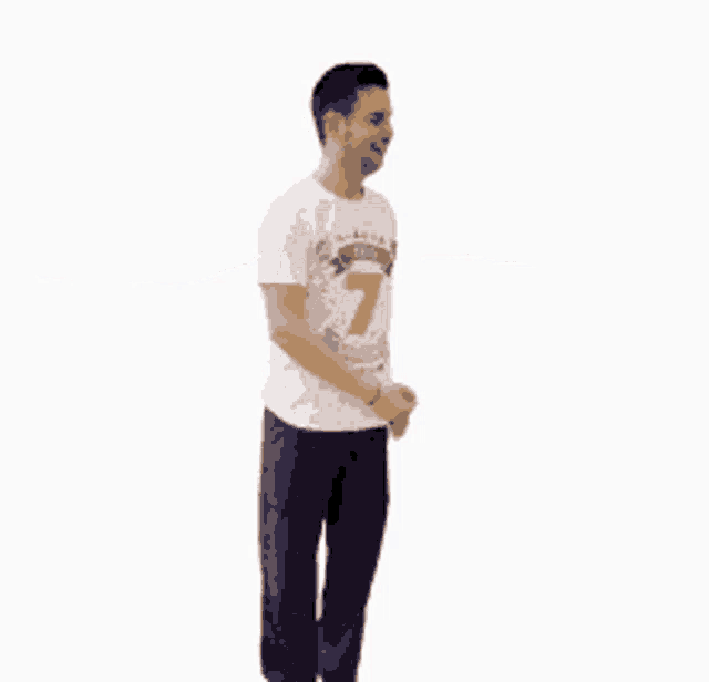 a man wearing a white shirt with the number 7 on it stands with his arms outstretched