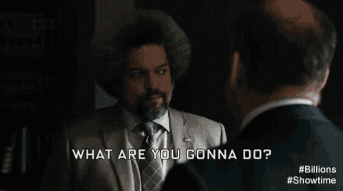 a man in a suit and tie is talking to another man and says what are you gonna do ..