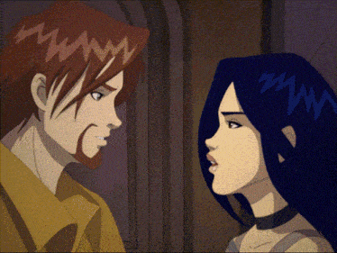 a man and a woman are looking at each other