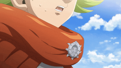 a close up of a person 's neck with a badge on it that says ' 13 '