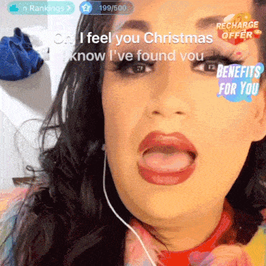 a woman wearing headphones says " oh i feel you christmas i know i 've found you " on a screen