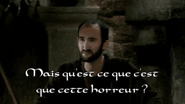 a man with a beard and the words mais quest ce que cest que cette horreur