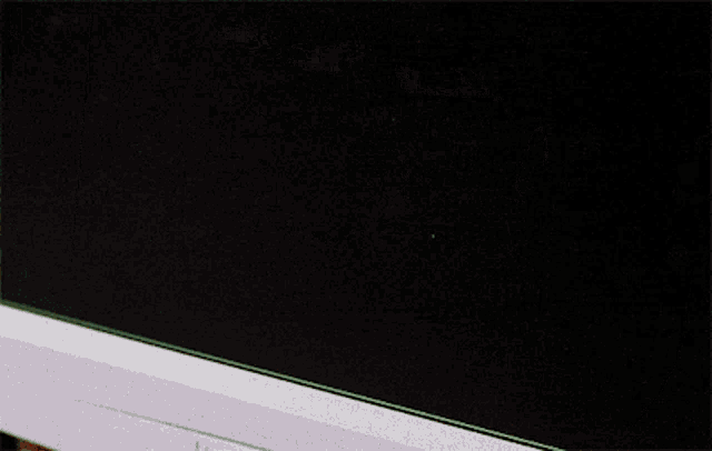 a picture of an orange sports car is on a black background