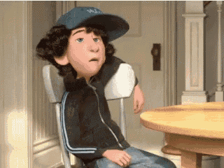 a cartoon character wearing a blue hat is sitting in a chair