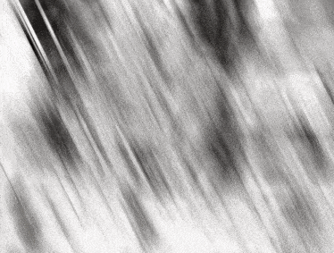 a black and white image of a waterfall