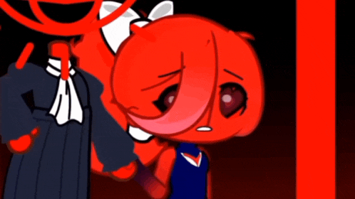 a red cartoon character is standing next to a red cartoon character in a dark room .