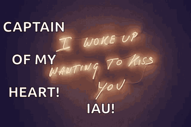 a neon sign that says captain i woke up wanting to kiss you