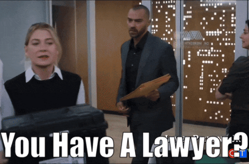 a man and a woman are standing next to each other with the words you have a lawyer
