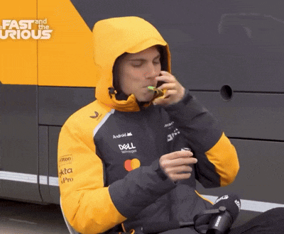 a man wearing a jacket that says fast and the curious