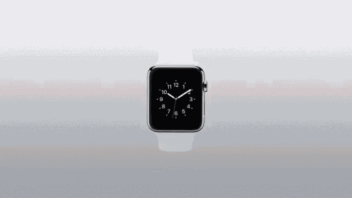 an apple watch displays the time as 10:09 on a grey background