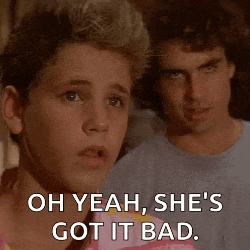 a young boy says oh yeah she 's got it bad in front of a man .