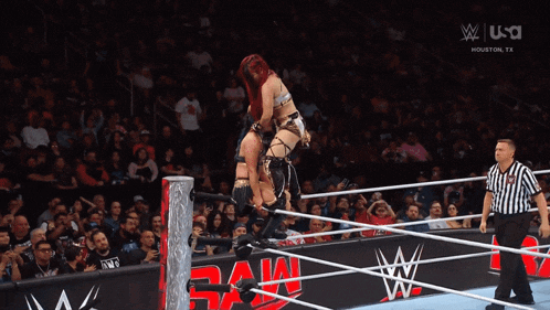 a wrestling match is being shown on a houston tv