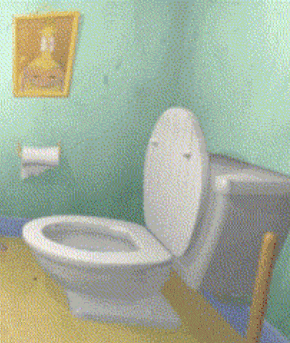 a toilet in a bathroom with a painting on the wall