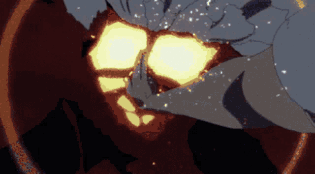 a close up of a person 's face with flames coming out of it 's mouth