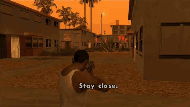a man in a video game is holding a gun and says " stay close "