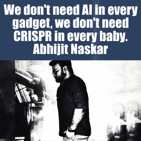a man is standing in front of a sign that says we don t need al in every gadget