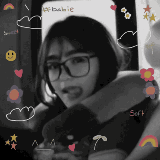 a black and white photo of a girl with glasses and the word babie on the bottom right