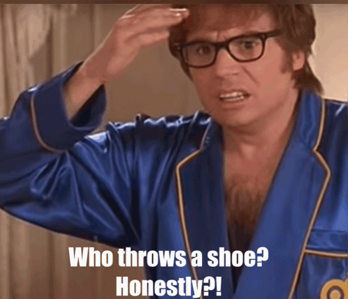 Austin Powers Who Throws A Shoe GIF - Austin Powers Who Throws A Shoe Shoe GIFs