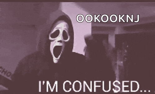 a person wearing a scary mask with the words `` i 'm confused '' written below it .