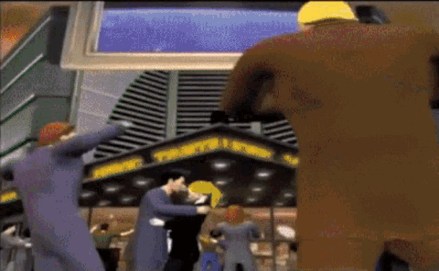 a group of people are dancing in front of a building that says theatre