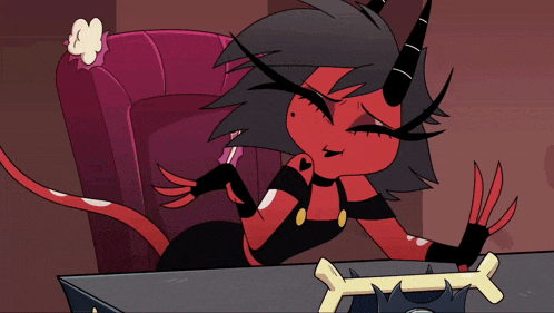 a cartoon character with horns is sitting at a table