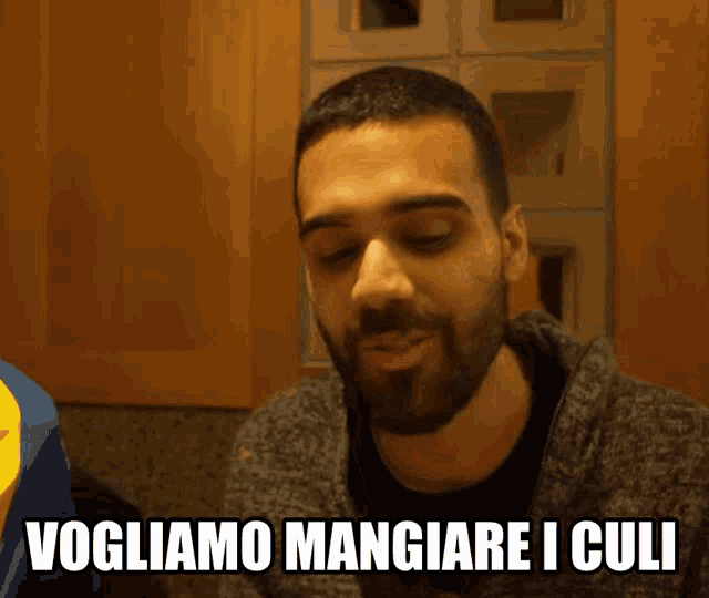 a man with a beard says " vogliamo mangiare iculi "