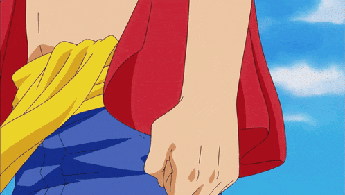 a close up of a person 's torso with a yellow shirt on