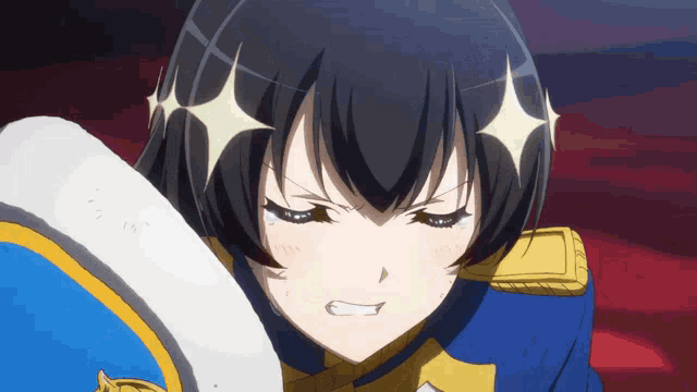 a girl with black hair and a blue and gold uniform has stars on her forehead