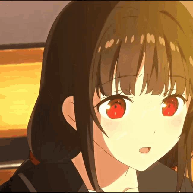 a close up of a girl with red eyes and black hair
