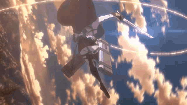 a man is flying through the air holding a sword .