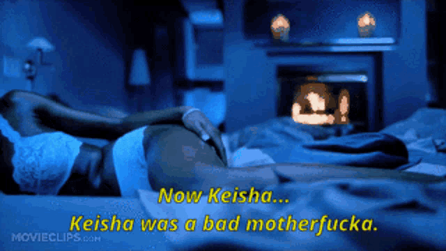a woman laying on a bed with the words now keisha on the bottom