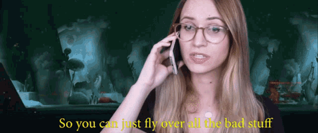 a woman talking on a cell phone with the words so you can just fly over all the bad stuff behind her