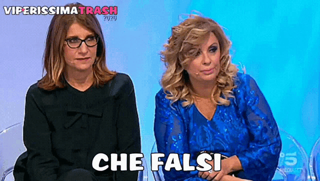 two women sitting next to each other with the words che falsi written on the bottom
