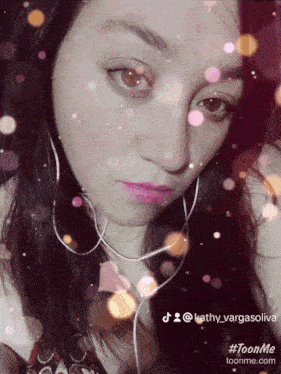 a close up of a woman 's face with the hashtag toonme on the bottom