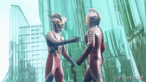 a gif from gifrun.com shows two superheros holding hands