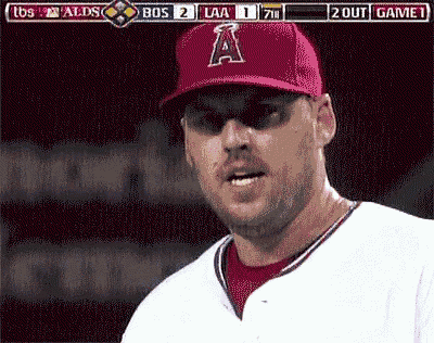 a baseball player wearing a red hat with the letter a on the front